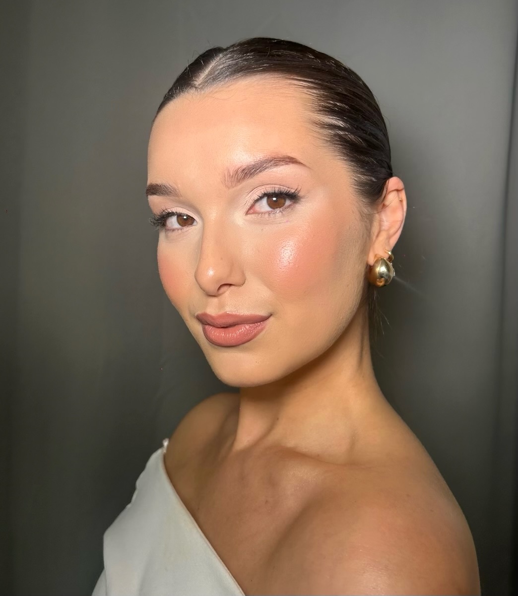 Soft glam makeup with dewy skin and nude lips